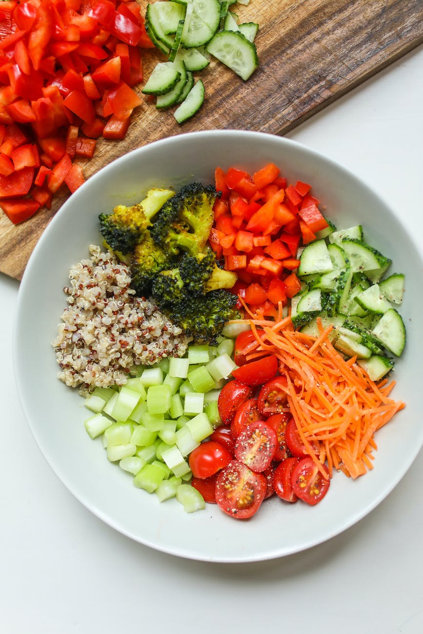 photo of bowl beside wooden chopping board